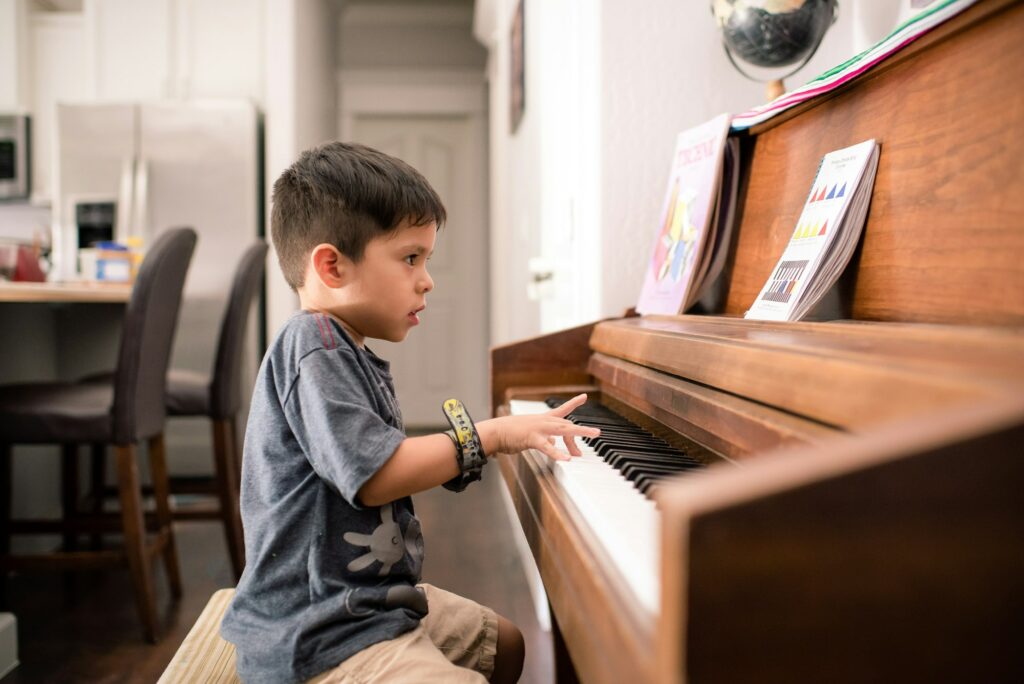 Boy practicing piano